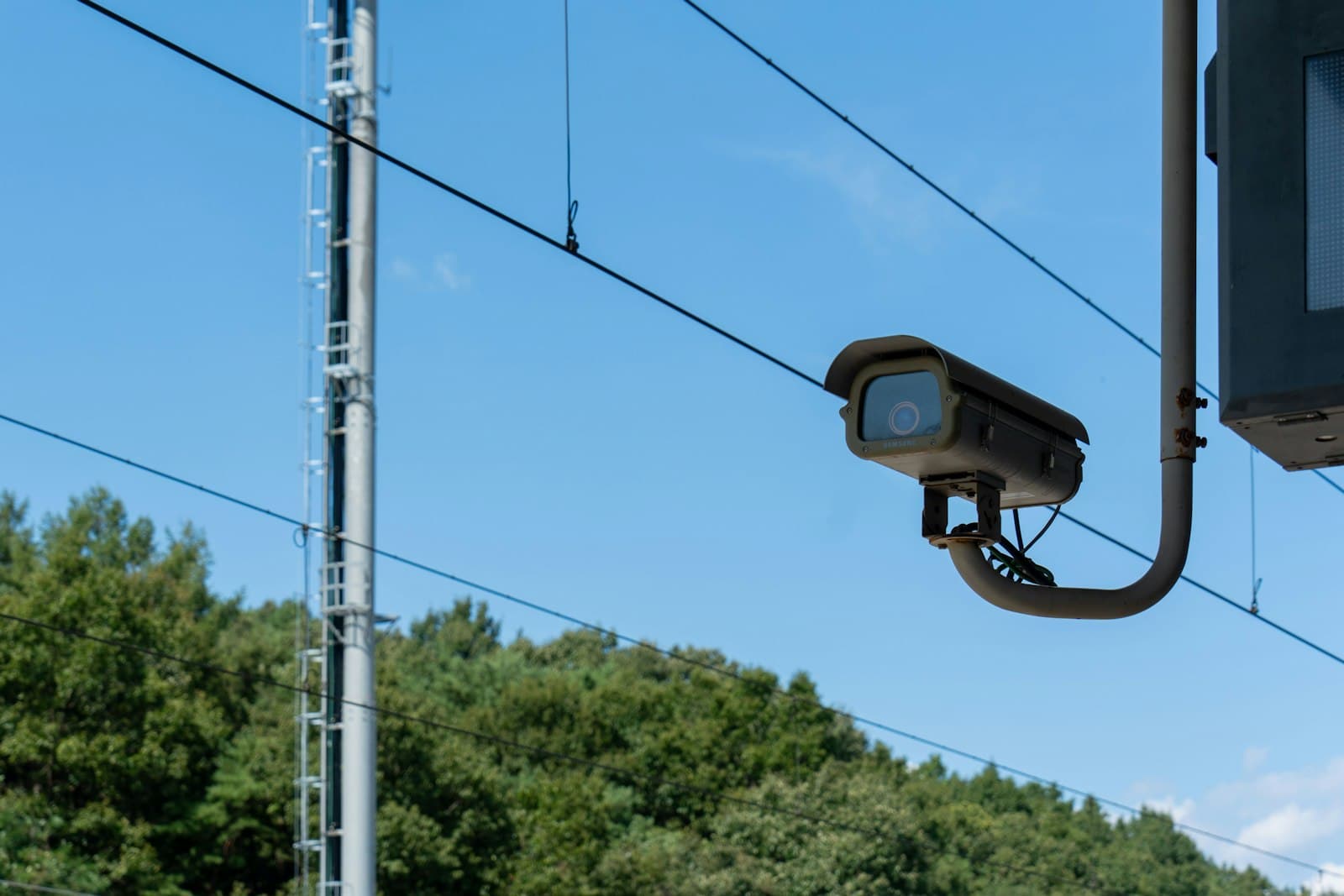 Outdoor CCTV camera representing commercial surveillance planning
